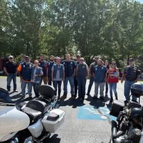 Group of riders and community members