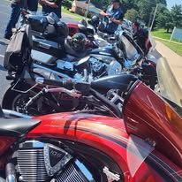 Motorcycles parked together at an Iron Horse Charities event