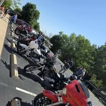 Motorcycles lined up during a charity gathering
